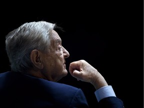 George Soros, Chairman of Soros Fund Management, listens during a seminar titled "Charting A New Growth Path for the Euro Zone" at the annual International Monetary Fund and World Bank meetings September 24, 2011 in Washington, DC.