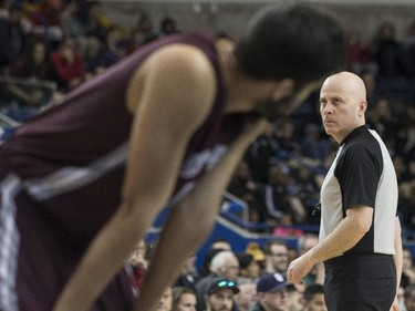 Halifax referee Paul Hansen officiates during the CIS basketball final between Carleton Ravens and Ottawa Gee-Gees in Toronto on Sunday, March 15, 2015.