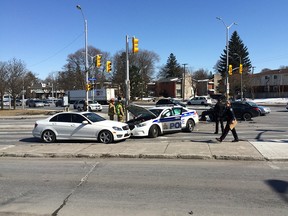 Traffic accident at intersection of Carling and Richmond involving a police cruiser on March 24, 2015.