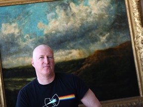 The National Gallery of Canada's director of conservation Stephen Gritt sits in front of a painting that was thought to be by John Constable when purchased in 1935, though it was later exposed as a fake. Such mistakes couldn't happen at the gallery today, Gritt says.