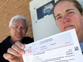 Hydro One has corrected Rachel and Conrad Potvin's electricity bill, but the couple still owe more than $21,000.  They're angry Hydro One took so long to bill them.