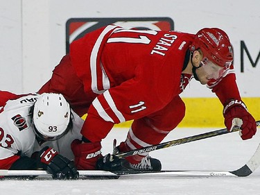 Carolina Hurricanes' Jordan Staal (11) collides with Ottawa Senators' Mika Zibanejad (93) of Sweden, during the second period.