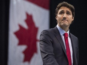 Liberal Leader Justin Trudeau delivers a speech during an event in Mississauga, Ont., on February 15 2015. Justin Trudeau says Stephen Harper is pandering to fears about Muslims with his insistence that no one should be allowed to wear a veil while taking the oath of Canadian citizenship.