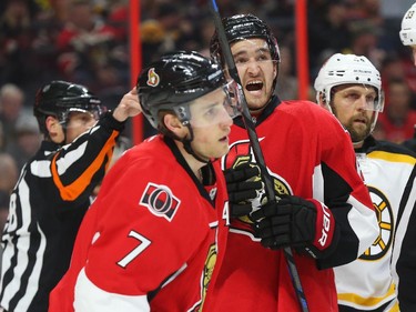 Mark Stone, right, of the Ottawa Senators screams at himself after not scoring on the Boston Bruins during first period NHL action.
