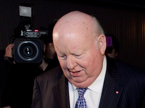 Media surround Senator Mike Duffy as he leaves Parliament in Ottawa on October 22, 2013. The provocative opening statements of the Crown and defence might start Sen. Mike Duffy's fraud and bribery trial off with a bang, but what follows in the early stages is expected to be decidedly less dramatic.