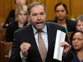 NDP Leader Tom Mulcair: Party is fighting the bill for its Quebec 'satellite' offices.