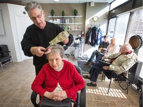 Murray Shaikin, 70, has been styling hair for over 50 years and he's had some of his clients for over 40 years. He's so dedicated to his customers that for some he'll drive to their retirement home every week to bring them to his salon. Client Peggy McDonald has her husband, Robert, right, drive her to the Richmond Road salon.