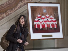 Ecole Polytechnique shooting survivor Nathalie Provost leaves the Supreme Court of Canada following a decision on Quebec's gun control records Friday, March 27, 2015 in Ottawa.