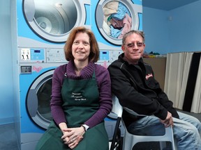 Nicole Thompson and her brother, Normand Racine, opened up their laundromat 24 hours a day in the West Quebec village of Portage-du-Fort, where many residents have been without running water for more than a month.