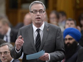 Finance Minister Joe Oliver answers a question during Question Period in the House of Commons on March 10, 2015.