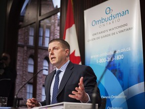 Ontario Ombudsman Andre Marin speaks at a news conference at Queens Park in Toronto on Tuesday February 4, 2014 to announce his latest investigation into complaints about billing practices by Hydro One.