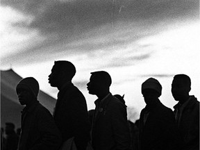 Detail of a photo by Lynn Ball of a supper line up at the end of the first day of the 50-mile march from Selma to Montgomery.