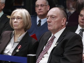 OTTAWA, ON: JANUARY 9, 2013 :  Sheila (left) and Shaun Fynes listen to the Military Police Complaints Commission investigation of the death of their son Edmonton soldier Stuart Langridge.  ( Chris Mikula / Ottawa Citizen) For NATIONAL story Assignment #111601