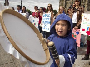 In 2012, four year old drummer Micheal Sammortuk joins members of Ottawa's Inuit Community on Parliament Hill to mark World Suicide Prevention day .