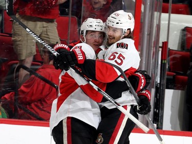 Patrick Wiercioch #46 of the Ottawa Senators celebrates his second period goal with teammate Erik Karlsson #65.