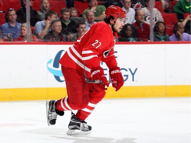 Justin Faulk #27 of the Carolina Hurricanes skates for position on the ice.