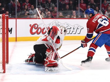Max Pacioretty #67 of the Montreal Canadiens scores a goal against Andrew Hammond #30 of the Ottawa Senators.
