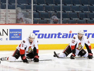 Bobby Ryan #6 and Eric Gryba #62 of the Ottawa Senators take part in the pre-game warm up.