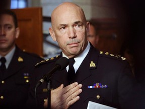 RCMP Commissioner Bob Paulson talks to the media after appearing at the Commons Public Safety committee to publicly display and discuss the video Michael Zehaf Bibeau filmed just prior to his shooting rampage on Parliament Hill on Friday.