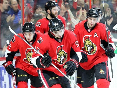 Ottawa's Mika Zibanejad celebrates with his teammates following his first period goal against San Jose.