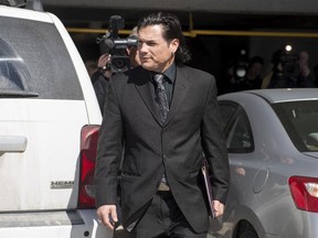 Suspended senator Patrick Brazeau leaves the Gatineau Courthouse for a break during the second day of his trial on charges of assault and sex assault.