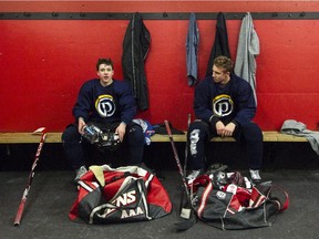 Peak Academy students Bennett Stockdale and Greg Meireles after their on-ice drills.