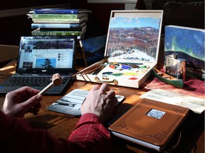 The desk of the anonymous man behind the Twitter account @TTLastSpring — tweeting as if he were Tom Thomson in his last few months of life.