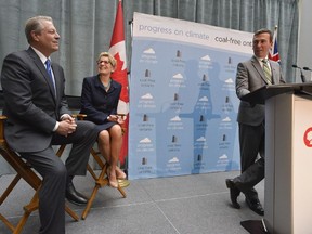 On November 21, 2013, former U.S. Vice President Al Gore (left), Ontario Premier Kathleen Wynne (centre) and Tim Gray, Executive Director, Environmental Defence celebrate Ontario as the first jurisdiction in North America to ban coal.