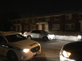 Police vehicles parked outside 1099 Whitton Place in Overbrook early Jan 15, where shots were fired during a break-in. No one was injured, according to police.