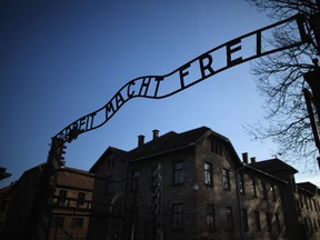 The infamous German inscription that reads 'Work Makes Free' at the main gate of the Auschwitz I extermination camp on November 11, 2014 in Oswiecim, Poland.