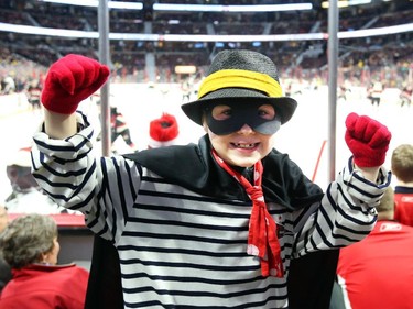 Rory Patton dressed as the Hamburglar shows his support for Andrew Hammond before the game.