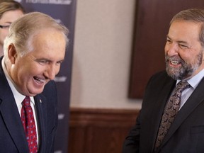 Roy Romanow (left) with federal NDP Leader Tom Mulcair in 2013.