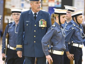 Major Peter Garton inspects members of the Navy League Cadet Corps at HMCS Unicorn.