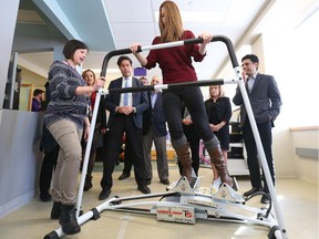 Sidney Fisher, 16-year-old patient of the CHEO chronic pain program, demonstrates a piece of equipment that she uses at CHEO to combat chronic pain.