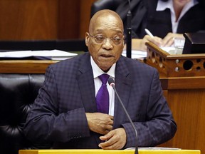 South African president Jacob Zuma speaks as he answers questions during a session in Parliament  at Cape Town, South Africa, Wednesday, March 11, 2015.