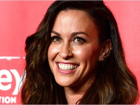 LOS ANGELES, CA - FEBRUARY 06:  Singer Alanis Morissette attends the 25th anniversary MusiCares 2015 Person Of The Year Gala honoring Bob Dylan at the Los Angeles Convention Center on February 6, 2015 in Los Angeles, California. The annual benefit raises critical funds for MusiCares' Emergency Financial Assistance and Addiction Recovery programs.