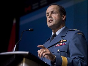 General Tom Lawson, chief of the defence staff, speaks to reporters in Ottawa on Thursday, Oct. 23, 2014.