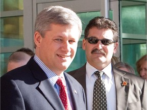 Bruno Saccomani, Canada's ambassador to Jordan, is seen here with Stephen Harper.