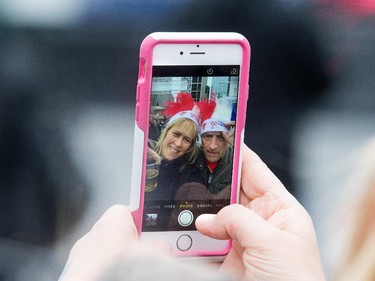 A couple Hab fans take a selfie at Fan Jam 2015 as the Ottawa Senators get set to take on the Montreal Canadiens at the Bell Centre in Montreal for Game 5 of the NHL Conference playoffs on Friday evening.