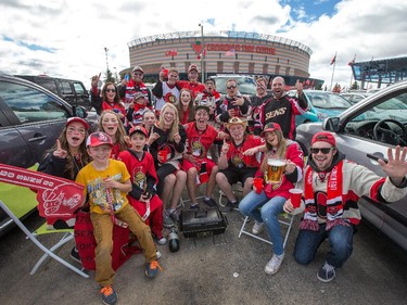 A group of university friends take advantage of the nice weather to enjoy a tailgate party outside the Fan Zone as the Ottawa Senators take on the Montreal Canadiens at the Canadian Tire Centre in Ottawa for Game 6 of the NHL Eastern Conference playoffs on Sunday evening.