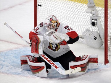 Ottawa Senators goalie Andrew Hammond (30) lets in the second goal during second period of Game 2 NHL first round playoff hockey action against the Montreal Canadiens Friday, April 17, 2015 in Montreal.