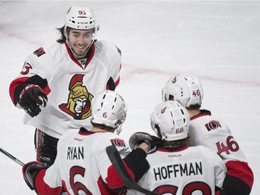 Ottawa Senators' Bobby Ryan (6) celebrates with teammates Mike Hoffman (68), Patrick Wiercioch (46) and Mika Zibanejad after scoring against the Montreal Canadiens during first period of Game 5 NHL first round playoff hockey action in Montreal, Friday, April 24, 2015.