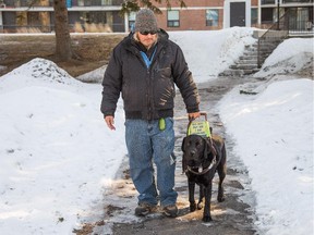 Bruce Boyd is blind and relies on his 4 year old guide dog "Ziggy" to help him get around. Boyd lives on a provincial disability pension and while he gets an extra $70 a month to feed his dog, he claims it doesn't come close to what he needs. He's tried to get help from many charitable sources with no luck. He's hoping publicity in The Ottawa Citizen can help. Assignment - 120143 Photo taken at 08:56 on March 24. (Wayne Cuddington / Ottawa Citizen)