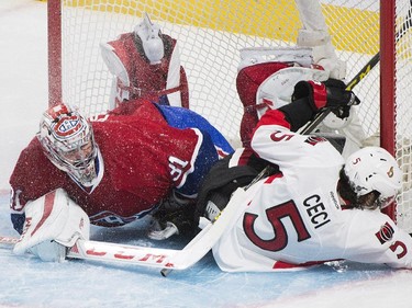 Ottawa Senators' Cody Ceci collides with Montreal Canadiens goaltender Carey Price during second period of Game 5 NHL first round playoff hockey action in Montreal, Friday, April 24, 2015.