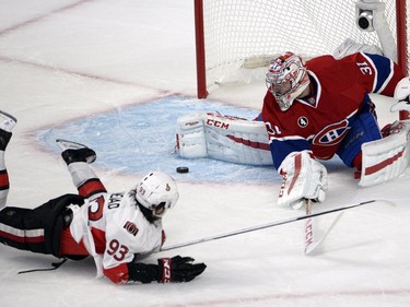 Montreal Canadiens goalie Carey Price (31) makes the save on Ottawa Senators center Mika Zibanejad (93)during first period of Game 2 NHL first round playoff hockey action Friday, April 17, 2015 in Montreal.