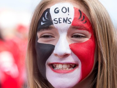 Chloe Hull, 11, has her face all painted up in the Fan Zone as the Ottawa Senators take on the Montreal Canadiens at the Canadian Tire Centre in Ottawa for Game 6 of the NHL Eastern Conference playoffs on Sunday evening.