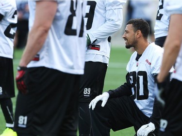 Chris Williams (80) takes a knee during practice at TD Place.