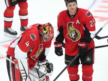 Craig Anderson (L) and Chris Neil of the Ottawa Senators show their dejection after losing to the Montreal Canadiens at Canadian Tire Centre in Ottawa, April 19, 2015.  (Jean Levac/ Ottawa Citizen)