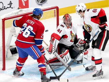 Craig Anderson makes a save in the first period as the Ottawa Senators take on the Montreal Canadiens at the Bell Centre in Montreal for Game 5 of the NHL Conference playoffs on Friday evening.