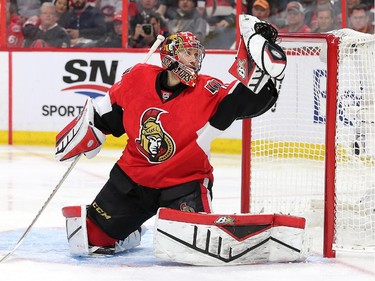 Craig Anderson makes a stop in the second period.